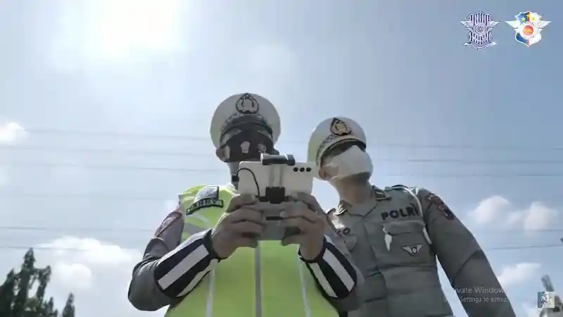 Foto - Setelah Handphone, Polisi Bisa Tilang Lewat Drone