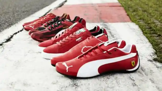 Foto - Ferrari Bakal Gunakan Baju dan Sepatu Balap Puma Hingga Tahun Depan